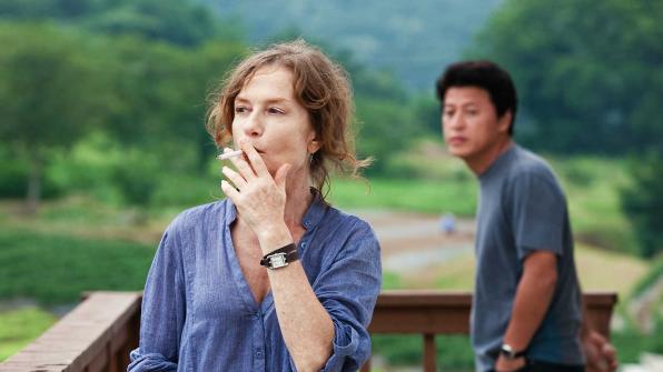 Isabelle Huppert and Joon-Sang Yoo | Still from "In Another Country"